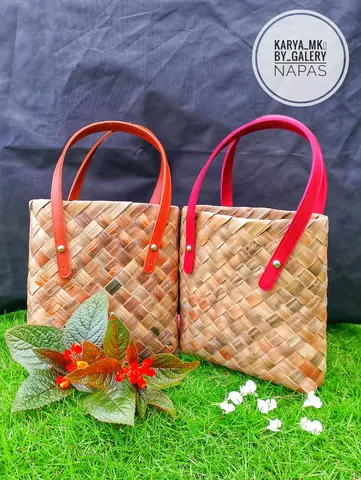Tas Tomang
