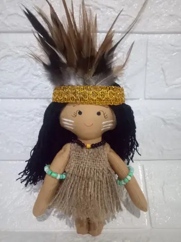 Boneka Berbie Papua